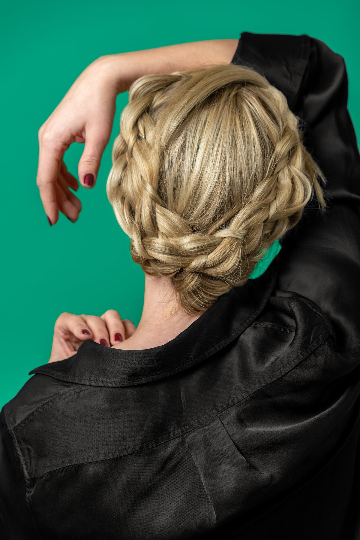 Rear view of an intricate braided style finished in the salon